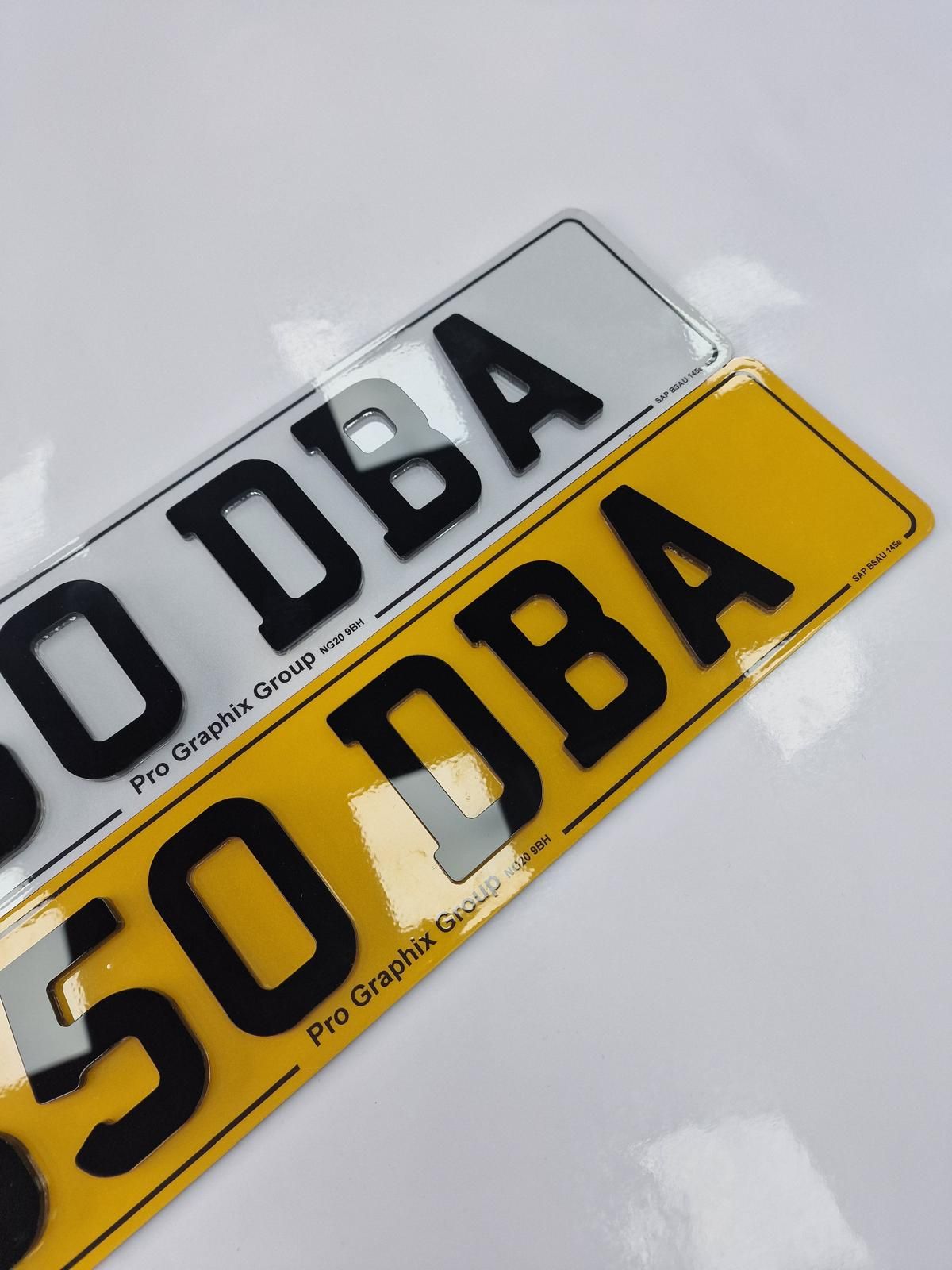 Close-up of black 4D acrylic number plates made by Pro Graphix Group